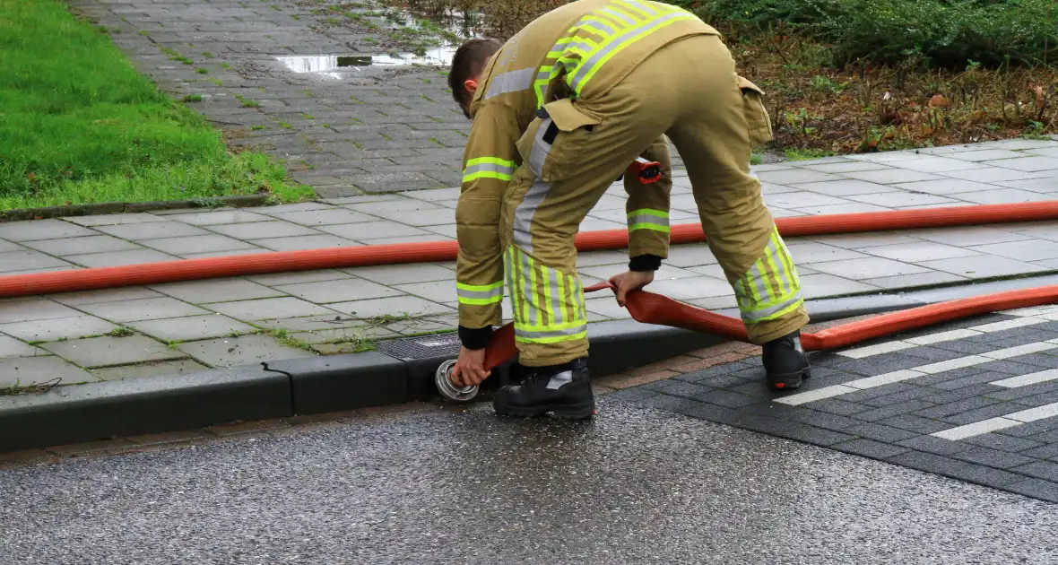 Brandweer pompt ondergelopen kelder leeg - Foto 3