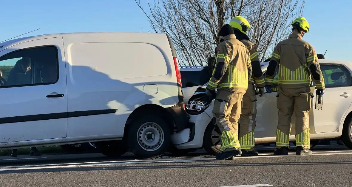 Schade en file na kettingbotsing - Foto 6