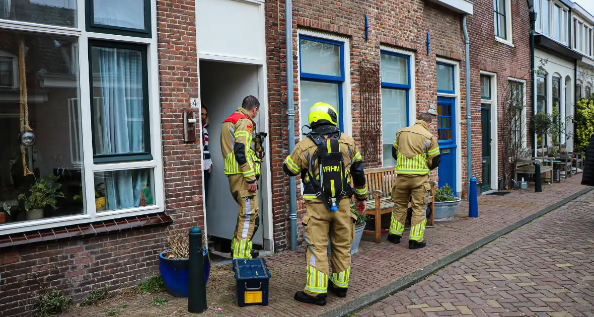 Onderzoek naar mogelijk brand in woning - Foto 3