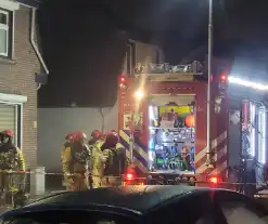 Flinke rookontwikkeling bij woningbrand, brandweer redt hond