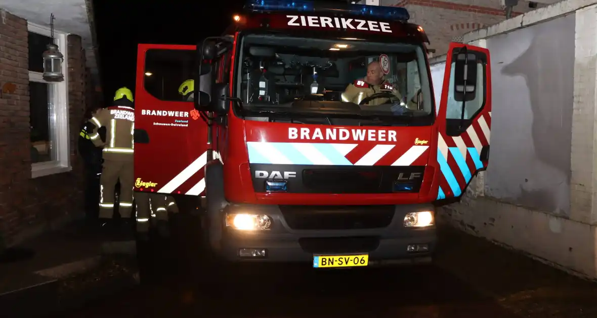 Brandgang onder water door spuitende kraan - Foto 1