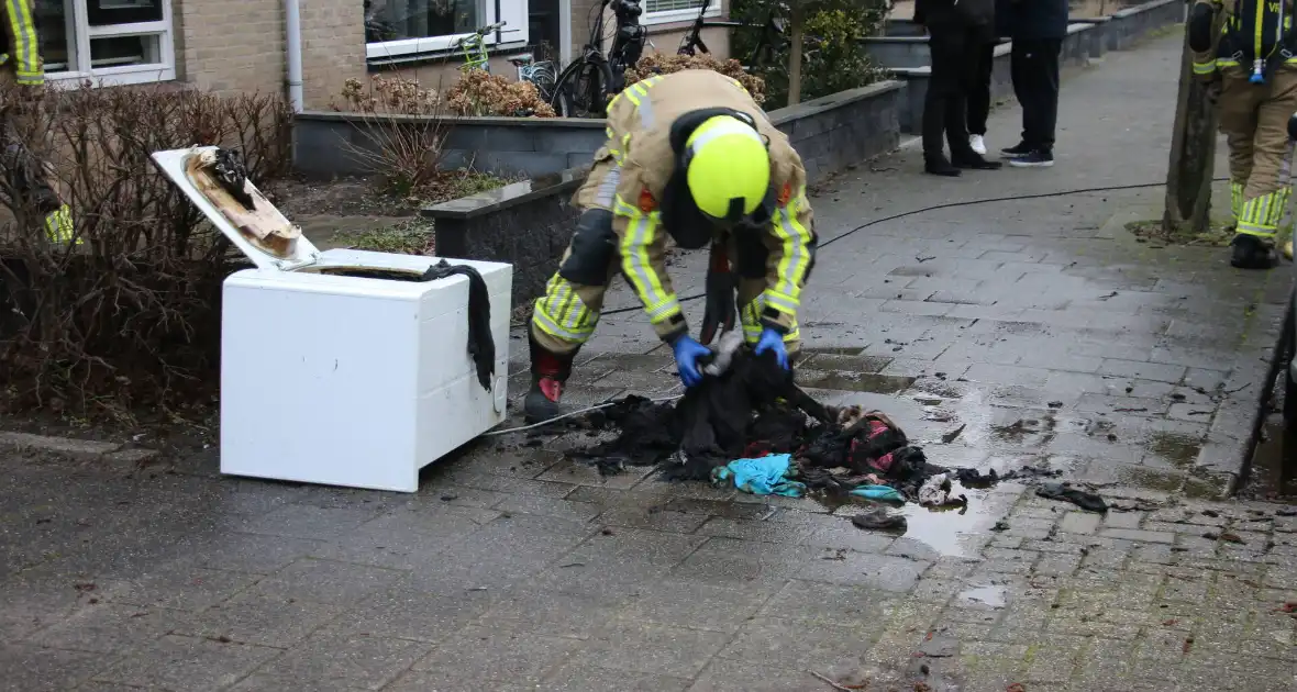 Droger vliegt in brand in woning - Foto 3