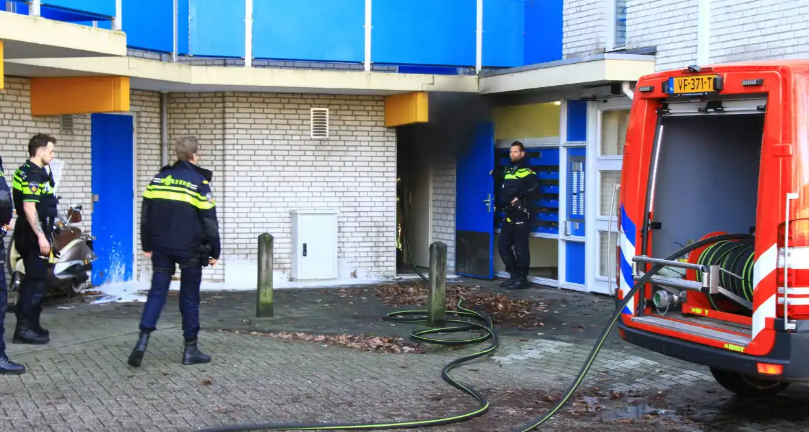 Rookontwikkeling bij brand in berging onder flat