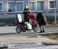 Scootmobiel aangereden door bestelbus