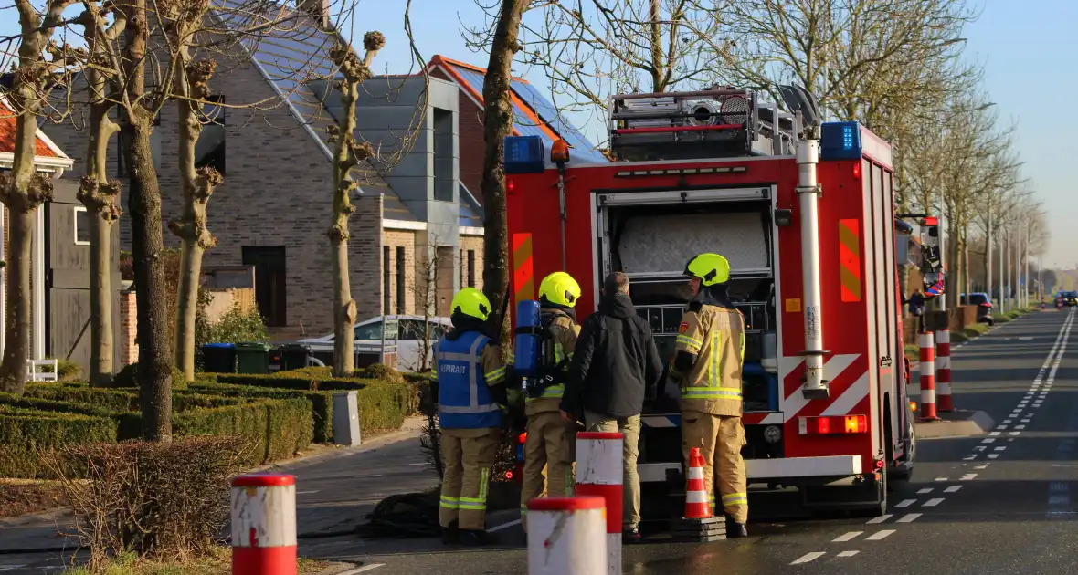 Schade door felle brand tegen schuur van woning - Foto 1