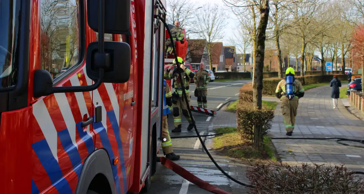 Schade door felle brand tegen schuur van woning - Foto 10