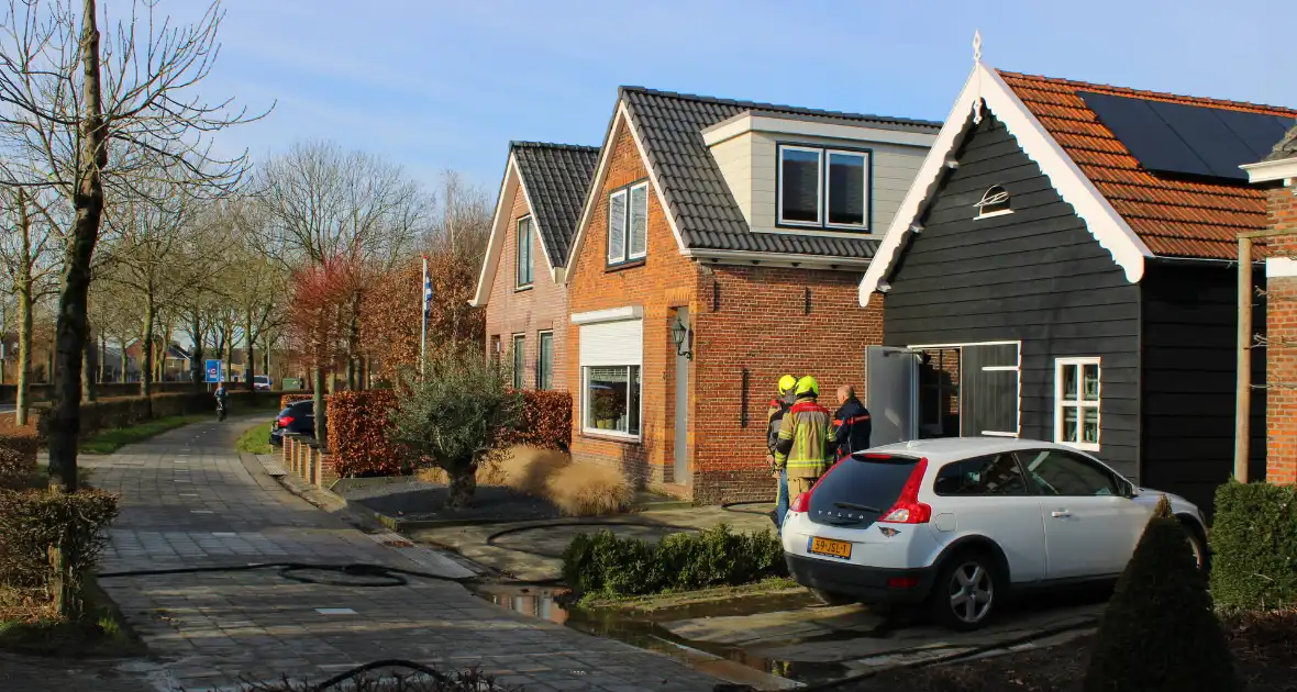 Schade door felle brand tegen schuur van woning - Foto 11