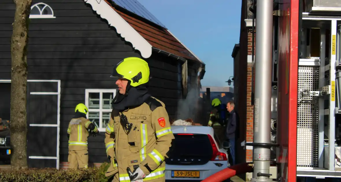 Schade door felle brand tegen schuur van woning - Foto 4