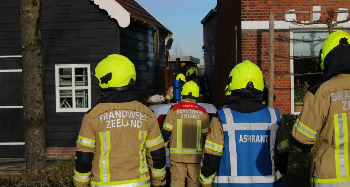 Schade door felle brand tegen schuur van woning - Foto 9