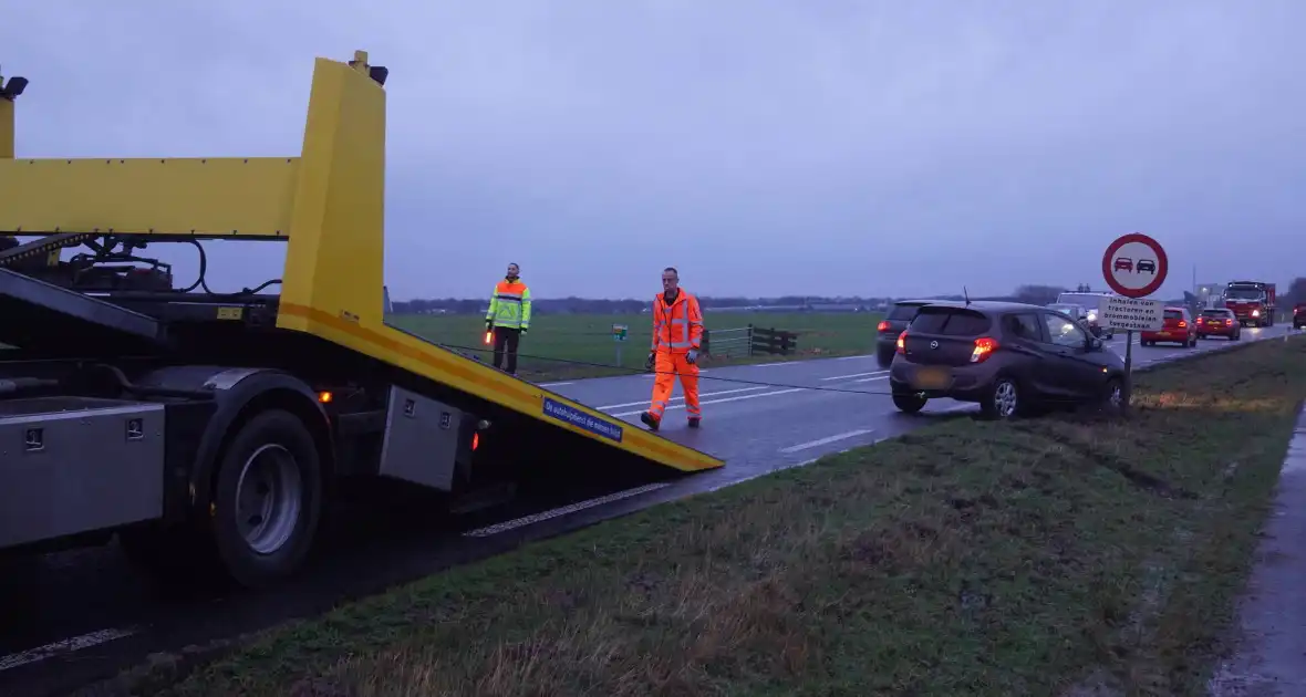 Verkeershinder na botsing tussen twee voertuigen - Foto 4