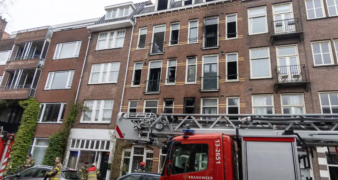 Enorme schade bij brand in woning - Foto 1