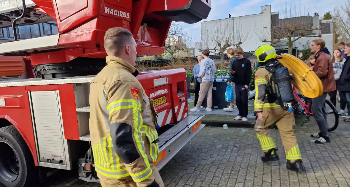 Flatgebouw ontruimd door brand - Foto 1