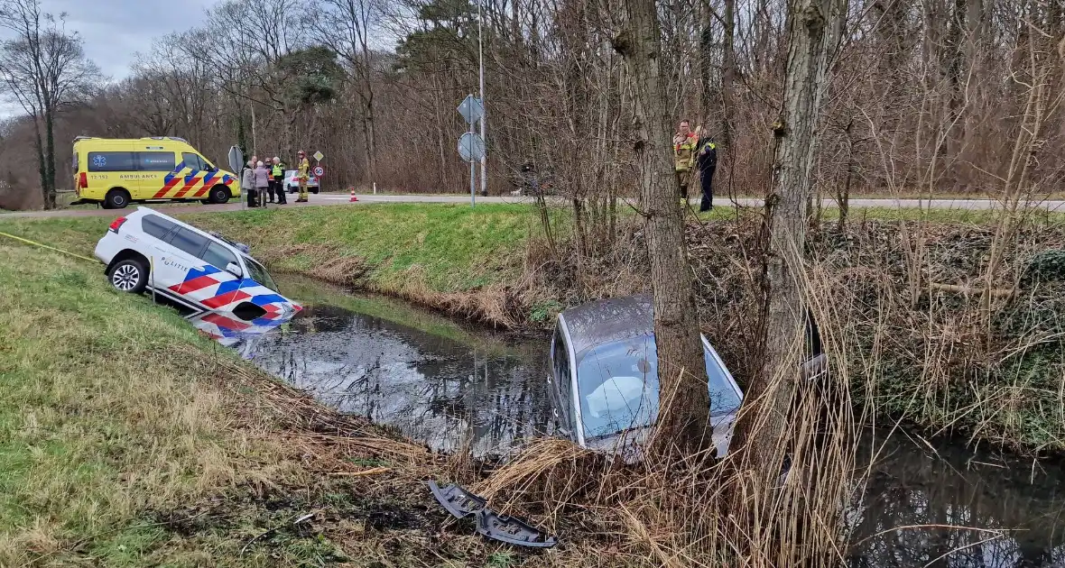 Politiewagen te water na vergeten handrem - Foto 5
