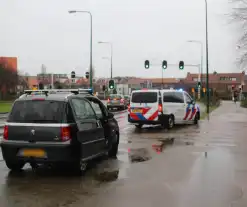 Schade bij kop-staartbotsing voor verkeerslicht