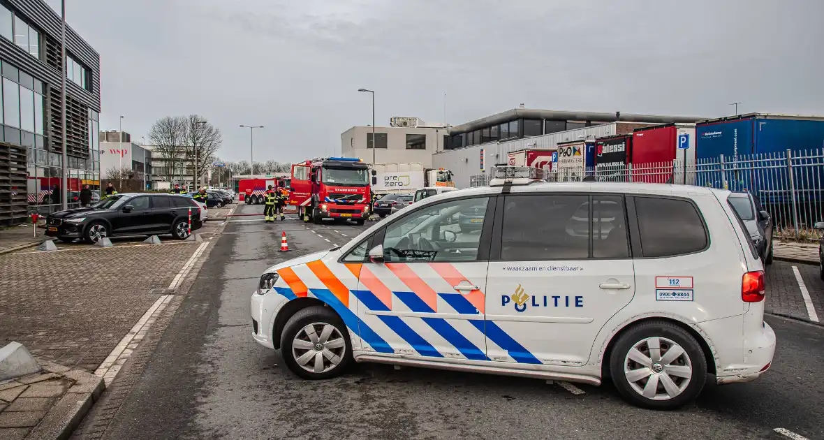 Lading van vuilniswagen vat vlam - Foto 7