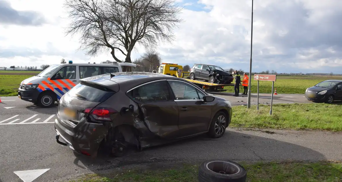 Dronken bestuurder zorgt voor grote schade op kruising - Foto 7