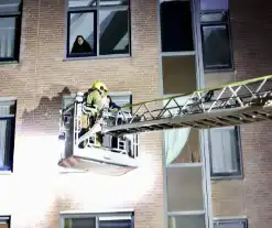 Meerdere bewoners gered bij hevige woningbrand