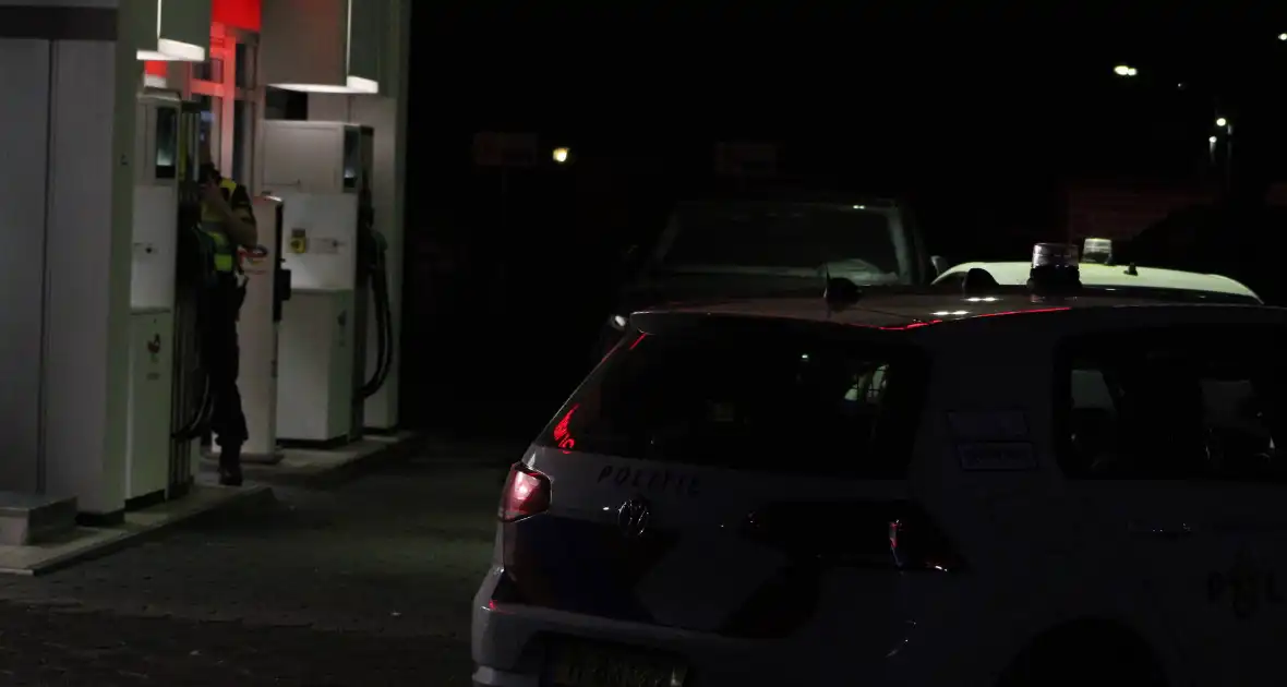 Total tankstation overvallen politie zoekt dader - Foto 2