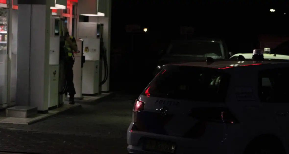 Total tankstation overvallen politie zoekt dader - Foto 4