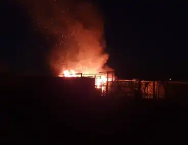 Uitslaande brand bij volkstuinencomplex