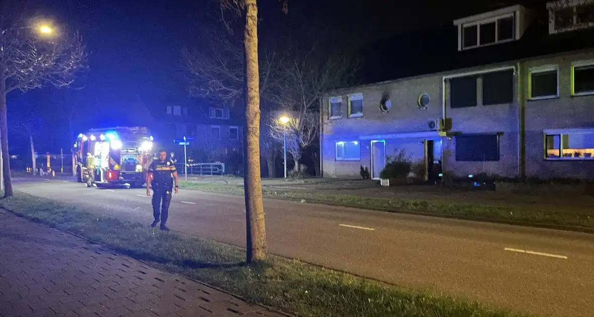 Flinke vlammen bij woningbrand op eerste etage - Foto 2