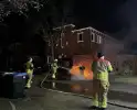 Brandweer blust brandende kliko's