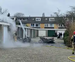 Flinke schade bij uitslaande brand in garagebox