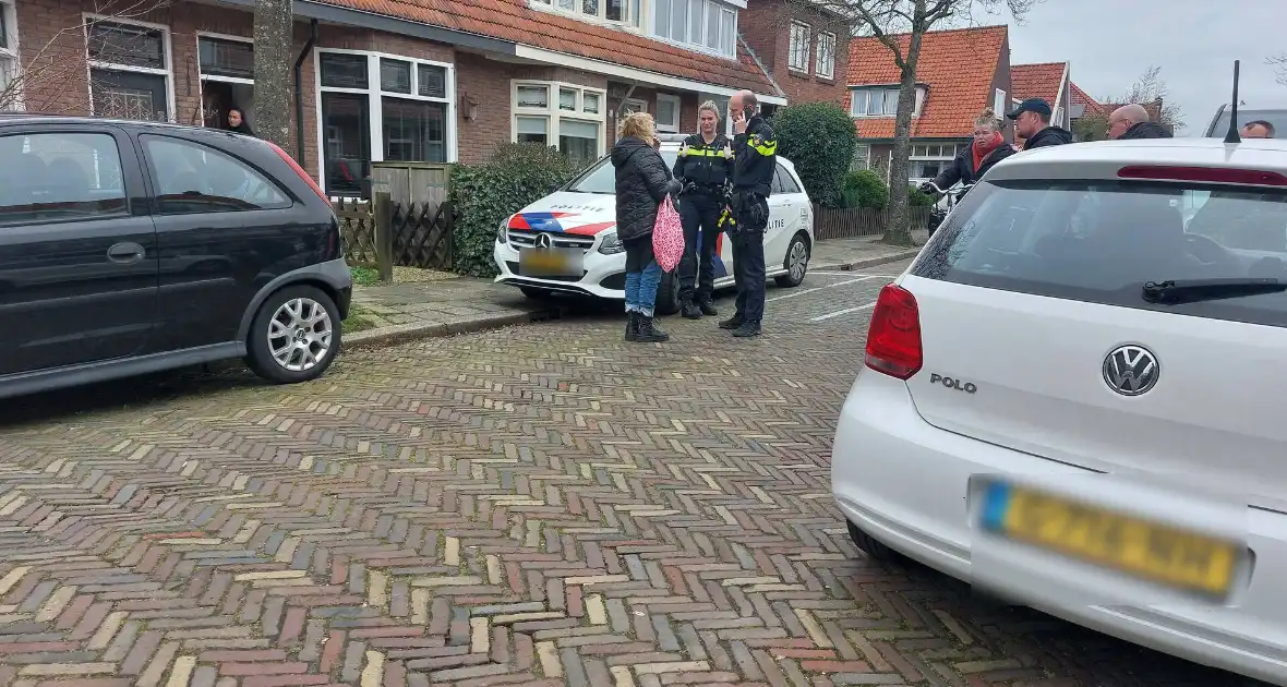 Vrouw beroofd op straat politie houdt verdachte aan - Foto 1