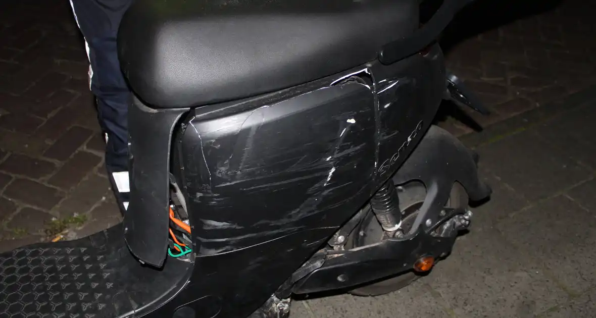 Scooterrijder gewond bij botsing met bus