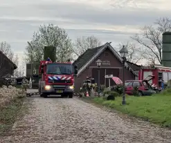 Brandweer blust brandende schoorsteen