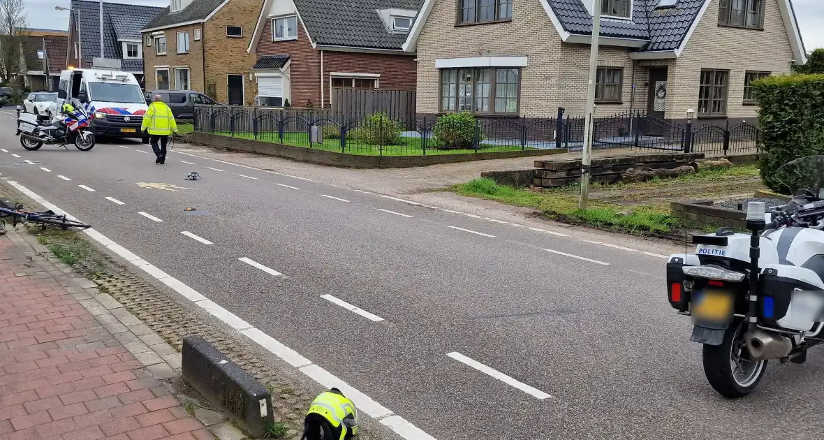 Motoragent onderweg naar overval krijgt ongeval met fietser - Foto 4