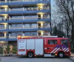 Rook uit flatwoning op vierde etage