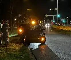 Auto fiks beschadigd na aanrijding met Fatbike