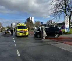 Automobilist en fietsster met elkaar in botsing