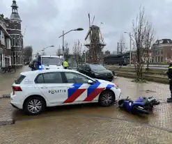 Vluchtende scooterrijder gewond bij aanrijding