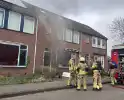 Rookontwikkeling bij brand in keuken van woning