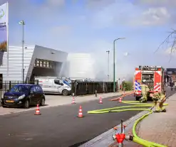 Brand in bouwafval container