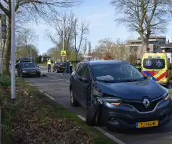 Flinke aanrijding tussen drie auto's