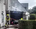 Garage aan woning met auto volledig afgebrand