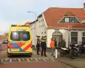 Bezorger op scooter gewond na val met fietser