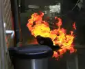 Jerrycan met benzine vat vlam