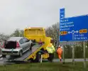 Auto belandt op de kant na ongeval