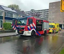 Brand in woning, meerdere mensen gecontroleerd door ambulancepersoneel