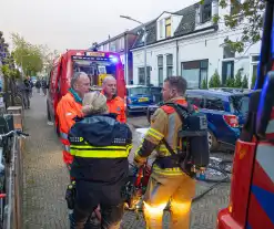 Brandweer redt hond bij woningbrand