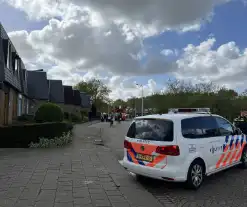 Brandweer blust woningbrand