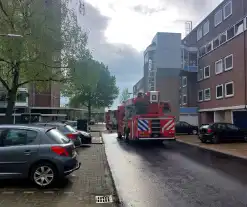 Brandweer ventileren appartement na brand in droger