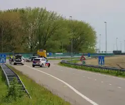 Ongeval tussen twee personenauto's bij invoegen snelweg