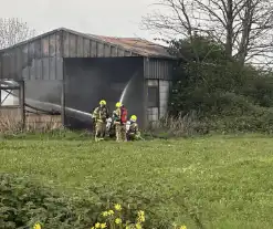 Uitslaande brand in verlaten schuur