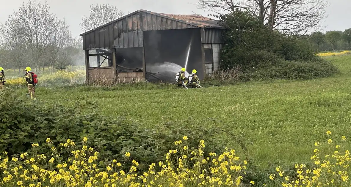 Uitslaande brand in verlaten schuur - Foto 3