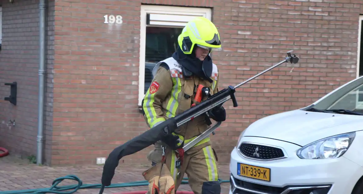 Autobrand slaat over naar buren - Foto 8